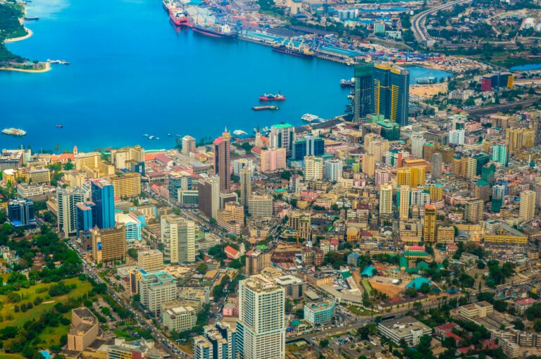 Aerial view of Dar es Salaam city with modern buildings and harbor in Tanzania.