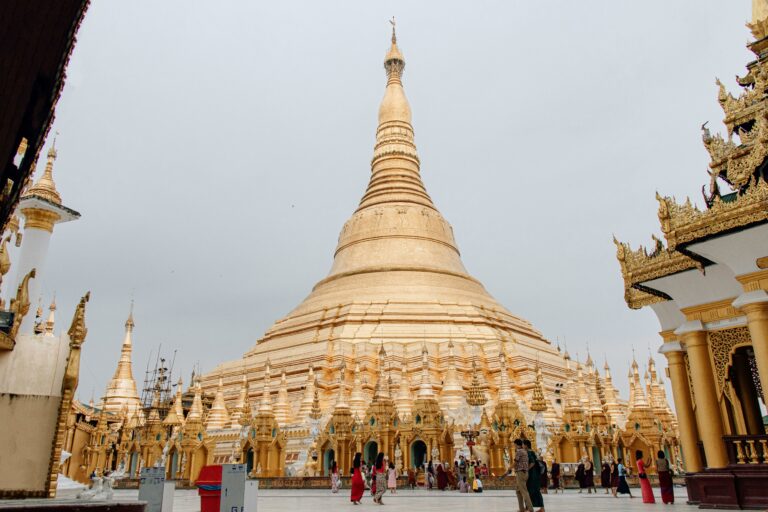 Golden pagoda in Yangon, Myanmar, showcasing stunning architecture and ornate details.